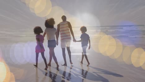 Animation-of-light-spots-over-african-american-family-walking-together