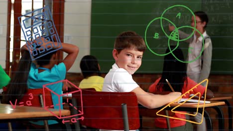 Animation-of-school-icons-over-caucasian-schoolboy-smiling-in-classroom-with-teacher-and-schoolmates