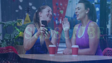 Animation-of-subscribe-text-over-two-caucasian-women-using-smartphone-on-climbing-wall
