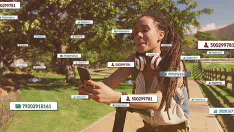 Animation-of-media-icons-over-biracial-woman-using-smartphone-with-scooter-in-park