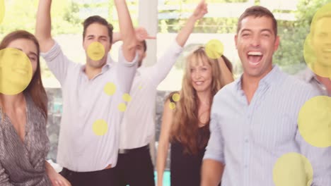 Animation-of-yellow-spots-over-smiling-caucasian-group-of-friends-dancing-at-party