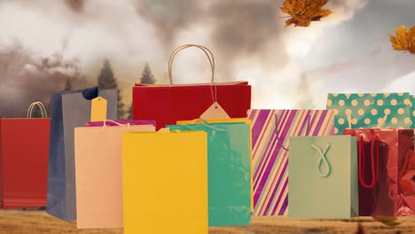 Animation-of-autumn-leaves-falling-over-presents-bags