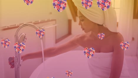 Animation-of-heart-icons-over-caucasian-woman-taking-bath