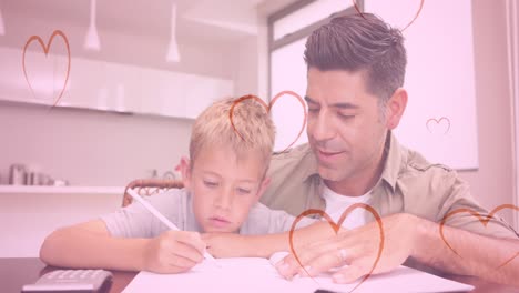Animation-of-hearts-falling-over-caucasian-man-and-his-son-doing-homework