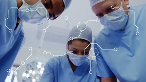 Animation-of-integrated-circuit-over-group-of-diverse-male-and-female-surgeons-at-surgery-room