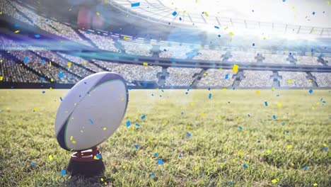 Animation-of-confetti-falling-over-rugby-ball-at-stadium
