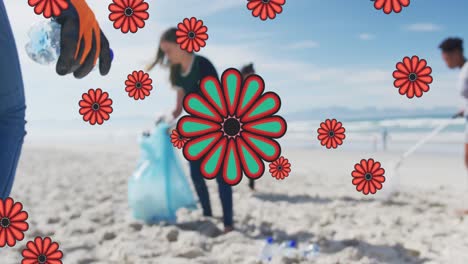 Animation-Von-Blumen-über-Verschiedenen-Weiblichen-Und-Männlichen-Freiwilligen,-Die-Am-Strand-Müll-Aufsammeln