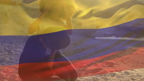 Animation-of-flag-of-colombia-over-african-american-couple-at-beach