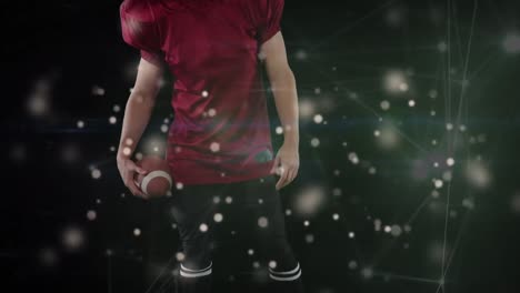 Animation-Des-Netzwerks-Von-Verbindungen-über-Einen-Kaukasischen-Männlichen-American-Football-Spieler-Mit-Ball