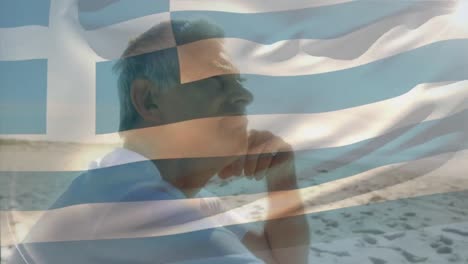 Animation-of-flag-of-greece-over-senior-caucasian-man-on-beach