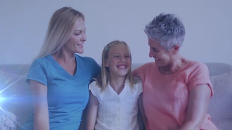 Animation-of-glowing-spots-over-happy-caucasian-grandmother,-mother-and-daughter