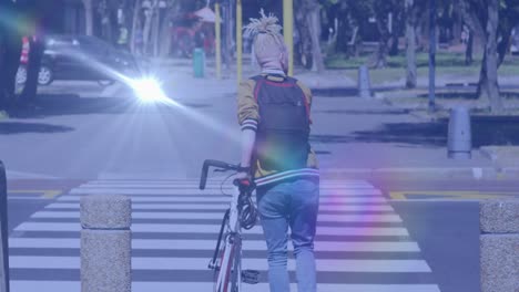 Animation-of-light-spots-over-albino-african-american-man-walking-with-bicycle