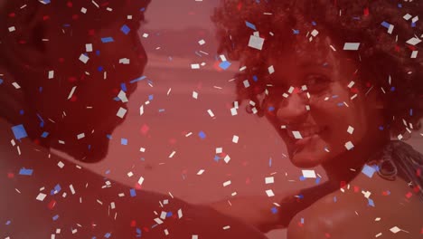 Animation-of-confetti-over-african-american-couple-at-beach