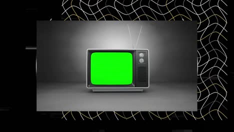 Animation-of-black-frame-with-glitch-over-grey-space-with-vintage-tv-with-copy-space