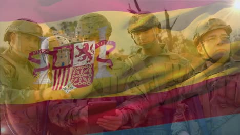 Animation-of-flag-of-spain-over-diverse-male-soldiers-with-tablet
