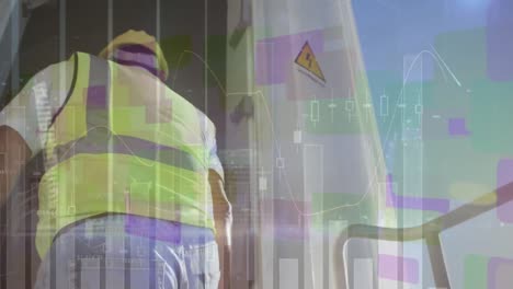 Animation-of-graphs-and-data-over-caucasian-male-worker-walking-into-wind-turbine