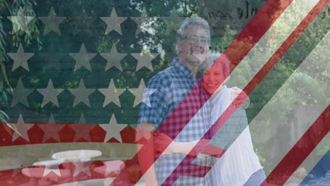 Animation-of-american-flag-over-senior-caucasian-couple-smiling