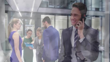 Animation-of-happy-caucasian-businessman-having-call-over-timelapse-with-walking-people