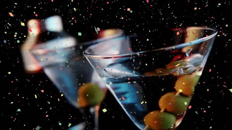 Animation-of-confetti-falling-over-cocktails
