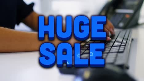 Animation-of-huge-sale-over-colorful-shapes-and-hands-of-biracial-woman-typing-on-keyboard