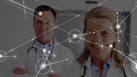 Animation-of-network-of-connections-over-caucasian-doctors