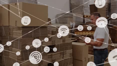 Animation-of-network-of-connections-over-warehouse-workers