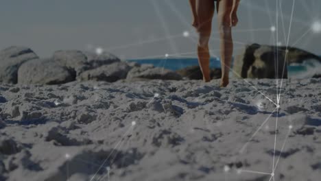 Animation-Von-Verbindungen-über-Den-Beinen-Einer-Kaukasischen-Frau,-Die-Am-Strand-Volleyball-Spielt