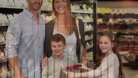 Animation-of-financial-data-over-happy-caucasian-family-shopping-at-market