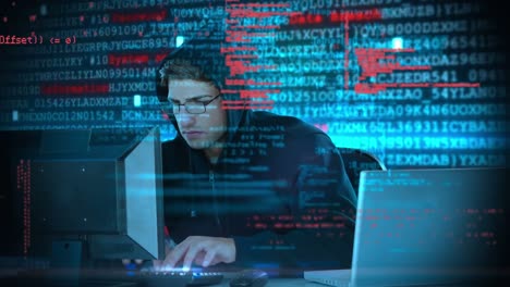 Animation-of-data-processing-over-caucasian-male-hacker-using-laptop