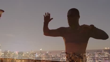 Animation-of-cityscape-over-an-exercising-african-american-man