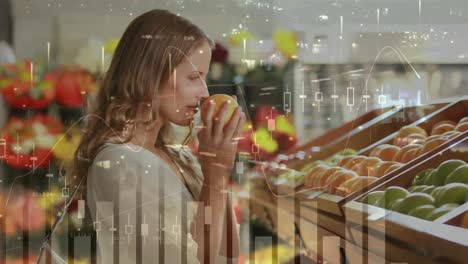 Animation-of-data-processing-over-smiling-caucasian-woman-smelling-fruit-in-shop