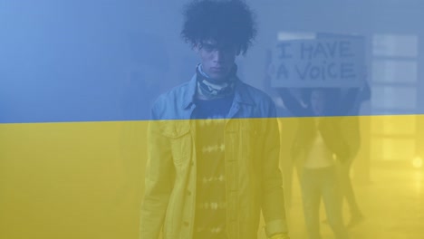 Animation-of-flag-of-ukraine-over-african-american-male-protester
