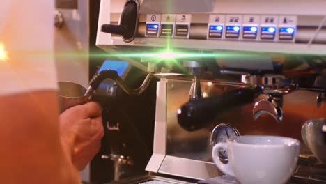 Animation-of-light-spots-over-caucasian-man-preparing-coffee-in-cafe