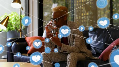 Animation-of-network-of-connections-over-african-american-businessman-talking-on-smartphone