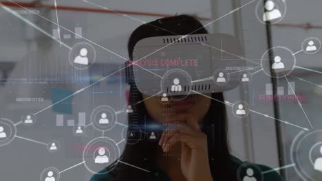 Animation-of-data-processing-and-connected-people-icons-over-caucasian-woman-using-vr-headset