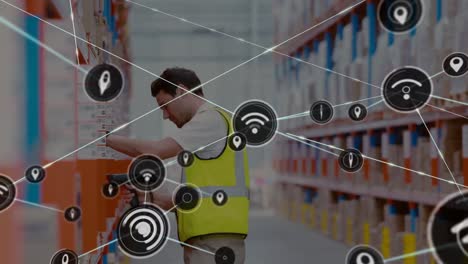 Animation-of-network-of-connected-wifi-icons-over-caucasian-male-worker-in-warehouse