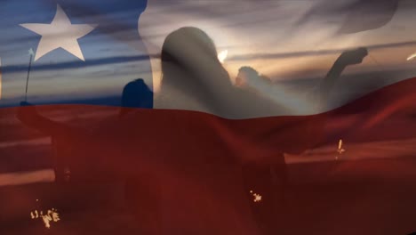 Animation-of-waving-of-chile-flag-over-group-of-friends-on-the-beach