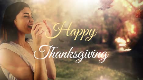 Animation-of-happy-thanksgiving-text-over-leaves-and-caucasian-woman