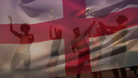 Animation-of-waving-england-flag-over-group-of-friend-on-the-beach