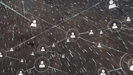Animation-of-network-of-connections-with-people-icons-over-snow-falling-on-grey-background