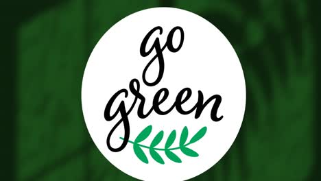 Animation-Von-„Go-Green“-Text-über-Dem-Schatten-Von-Pflanzen-Auf-Grünem-Hintergrund