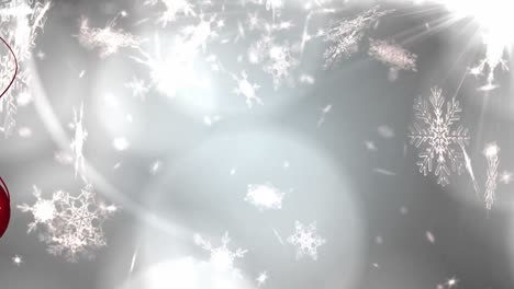 Animation-Von-Schnee,-Der-über-Helle-Flecken-Auf-Grauem-Hintergrund-Fällt