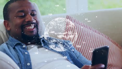 Animation-of-connections-and-globe-over-happy-african-american-man-using-smartphone