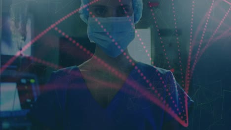 Animation-of-dna-strand-over-female-surgeon-in-face-mask