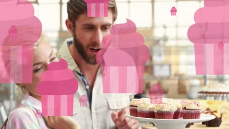 Animation-of-caucasian-couple-smiling-and-buying-cake
