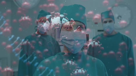 Animation-of-virus-cell-and-dna-over-diverse-female-and-male-surgeons-in-face-masks