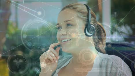 Animation-of-network-of-connections-over-caucasian-businesswoman-using-phone-headset