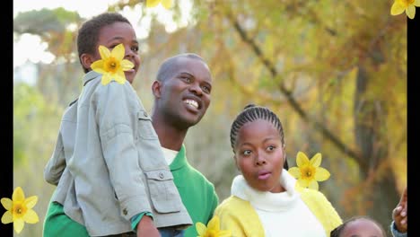 Animation-of-failing-flowers-over-african-american-family-outside