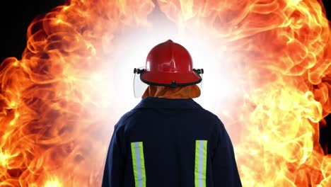 Animation-of-firefighter-over-fire-on-black-background