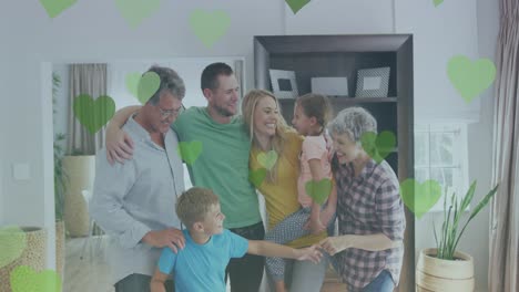 Animation-of-failing-green-hearts-over-happy-caucasian-family